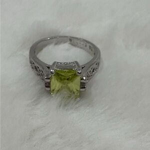 Elegant Silver Ring with Green Gemstone